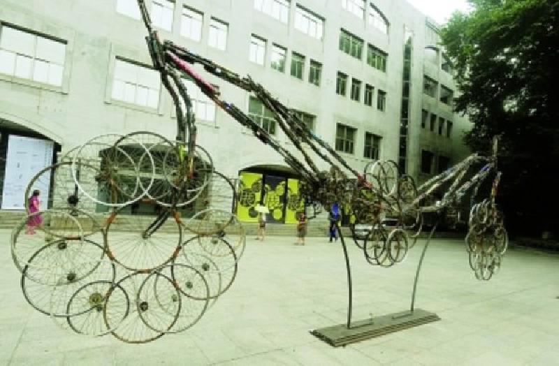 A bicycle sculpture with a moody, robotic atmosphere